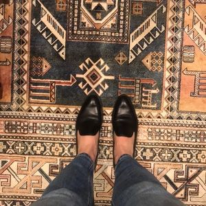 Black leather loafers